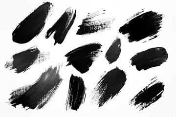 Abstract black paint strokes on a white canvas, showcasing various brush techniques and textures for artistic and creative backgrounds, designs, and concepts.