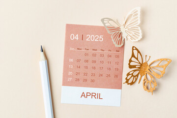 April 2025 calendar card for the organizer to plan and reminder and butterfly paper on yellow.