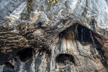 Interior of the large hall of old Karain cave, hidden in Mediterranean region. Confirms human habitation since the early Paleolithic age between 150,000 and 200,000 years ago.Yagca, Antalya, Turkey.