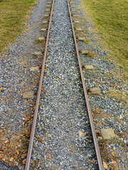 View of train Railway Tracks from the middle during daytime