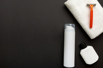 shaving man set. shaving machine, towel, lotion and shaving foam on colored background. Men bath Accessories top view