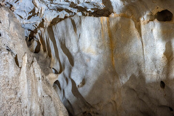 Interior of the large hall of old Karain cave, hidden in Mediterranean region. Confirms human habitation since the early Paleolithic age between 150,000 and 200,000 years ago.Yagca, Antalya, Turkey.