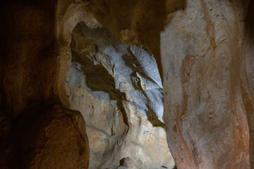 Interior of the large hall of old Karain cave, hidden in Mediterranean region. Confirms human habitation since the early Paleolithic age between 150,000 and 200,000 years ago.Yagca, Antalya, Turkey.