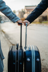 Obraz premium Boyfriend and girlfriend packing suitcases in car preparing to travel 