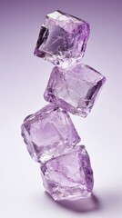 Fototapeta premium A stack of purple crystals on a purple background