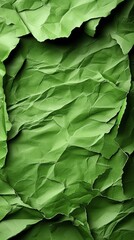 a close up of a piece of green paper with a hole in it