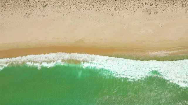 Golden sands and emerald waters at Comporta Beach.