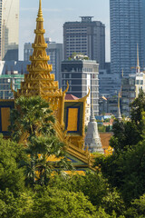 The throne hall inside the royal palace and new skyscraper in Phnom Penh, Cambodia