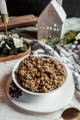 Christmas Kutia Ukrainian Christmas holiday dish, wheat with honey, poppy seeds, raisins, dessert, Scandinavian style, ethnic dishes