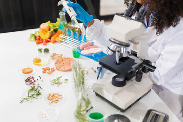 Microbiologists and nutrition experts analyze molecular samples in advanced food science labs, exploring innovations in nutrition, psychiatry, and health science research.