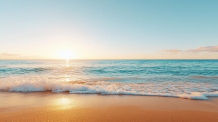 Obraz premium Serene beach at sunset with gentle waves and clear sky.