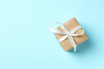 Beautiful gift box on color background 