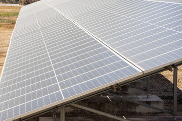 Solar panels converting sunlight into renewable energy in a power plant