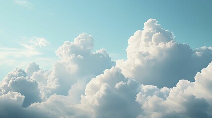 Blue sky with fluffy white clouds on a sunny day in the countryside, perfect for nature and relaxationthemed content.