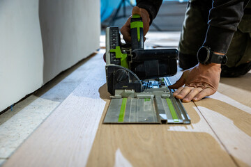 Close Up of Track Saw in Use for Flooring Installation Project