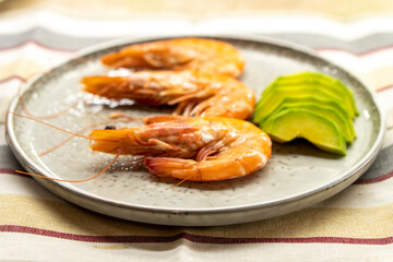 Boiled large shrimps on plates.Food concept.Seafood.Diet