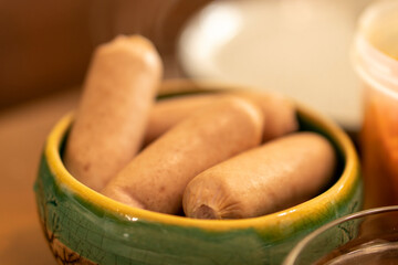 Sausages in a round bowl.Food concept