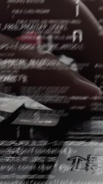 Creative visual of computer programming coding and software development shown by man working on computer keyboard with overlay of computer graphic displaying abstract program codes and computer script