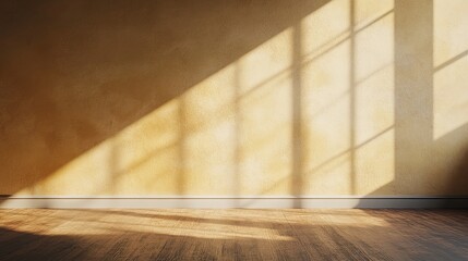 Sunlight streams through a large window onto a wooden floor, casting geometric shadows and creating a warm atmosphere in the room during the afternoon