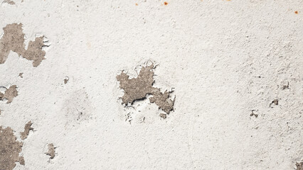 The white walls are peeling off. 4