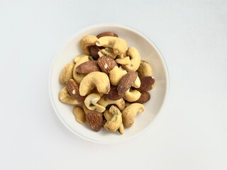 Bowl of roasted almonds and cashews
