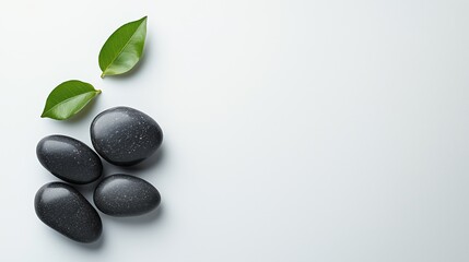 Naklejka premium Zen-Inspired Still Life With Smooth Black Stones