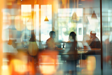 Defocused abstract background featuring a modern meeting room with natural light and a professional team collaborating. Ideal for business and corporate visuals.
