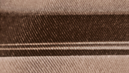 Brown background with wavy diagonal geometric stripes texture.