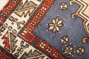 Textures and patterns in color from woven carpets
