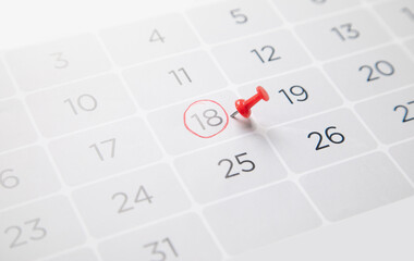 Push pin on a calendar. Planning. Business