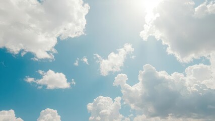 Naklejka premium Azure sky, fluffy white cumulus clouds, bright sunlight, overhead, photography, horizon