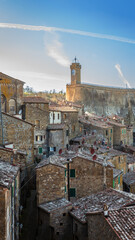 Obraz premium Sorano is a tuff rock town in Tuscany, Italy, carved into cliffs with ancient stone houses, narrow alleys, and rich Etruscan history. Surrounded by lush nature, it offers breathtaking views.