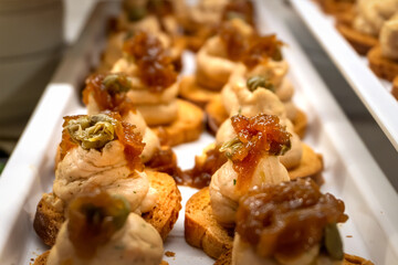 Bruschetta with seafood pasta and pistachios - Restaurant menu, table setting, festive buffet