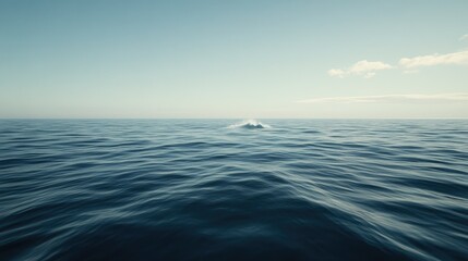 Obraz premium A single giant wave cresting in the middle of the open ocean, with the horizon blending into the sky