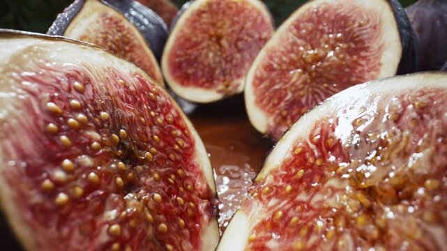 Camera Moves Between Sliced Halves, Healthy Juicy Ripe Figs. Dolly Slider Macro 