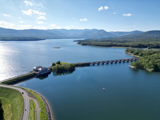 aerial view of the ashokan reservoir in upstate new york (near woodstock olivebridge) nyc drinking water and catskill mountains (catskills hills background) park road walkway bridge crossing lake pond