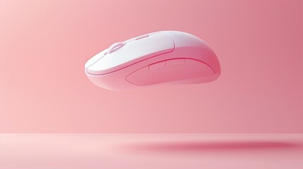 Wireless mouse balancing with pink background