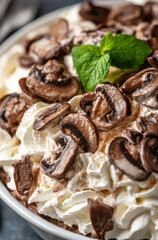 Fototapeta premium Beef stroganoff with mushrooms in a slow cooker, close-up. 