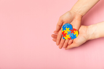 Autism puzzle.Autism awareness day. Colorful bright puzzles.Puzzle. 2 April world autism awareness day background. Top view. Space for text.Copy space.Design element.Care Awareness campaign for Autism