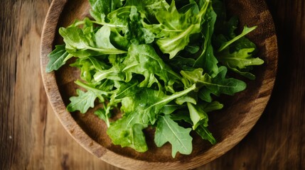 Fresh Green Salad Leaves on Wooden Plate - A Healthy and Delicious Meal