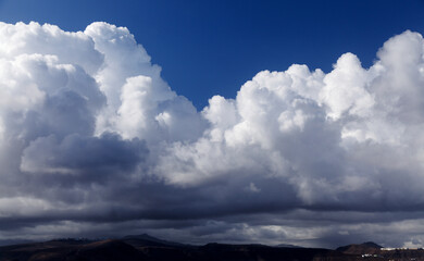 Obraz premium Cumulus, clouds, flat bases, described, puffy, cotton-like, fluffy, appearance, Latin, meaning , heap,pile