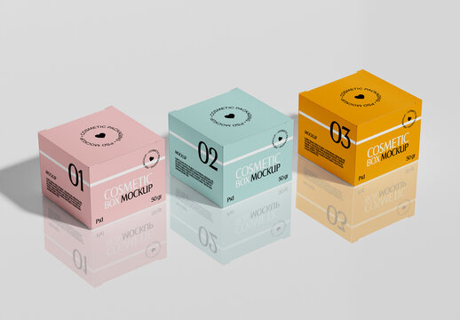 Three Packaging Box with Reflective Surface Mockup 