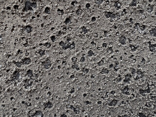 Hardened wet ash forms a texture similar to the moon's surface or bacterial colonies. Trypophobia alert: Do not look