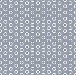 Vector circles graphics. Seamless vector line art ring pattern with simple modern geometric design. Polka dot outline fashion print. White rings on silver grey background.
