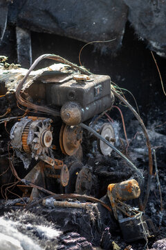 A burnt out engine in a boat wreck