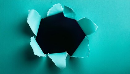 turquoise paper ripped inside the center remoted on a background