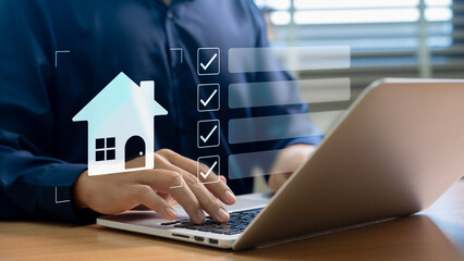 Real estate checklist concept, A professional organizing real estate tasks on a laptop using a...