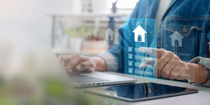 Real estate checklist management concept, A professional managing real estate services on a laptop, with a digital checklist property evaluations, and investment strategies efficiently.