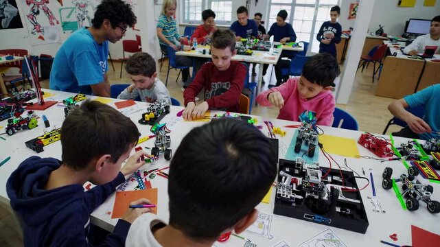 Kids engage in robotics workshop fostering creativity and teamwork in a vibrant classroom setting