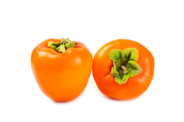 Persimmon isolated on white background. Persimmon fruit. Slice of ripe, juicy, sweet persimmon fruit. Vegan. Fruit garden. Close-up.